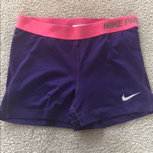 Purple Nike Pros in size Large